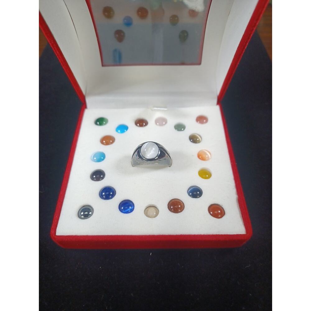 Sterling Silver Ring With 19 Interchangeable Cat Eye Stones Beautiful size 6